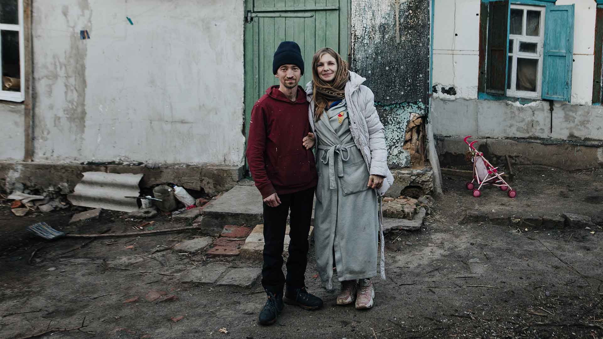 Man and woman standing outside